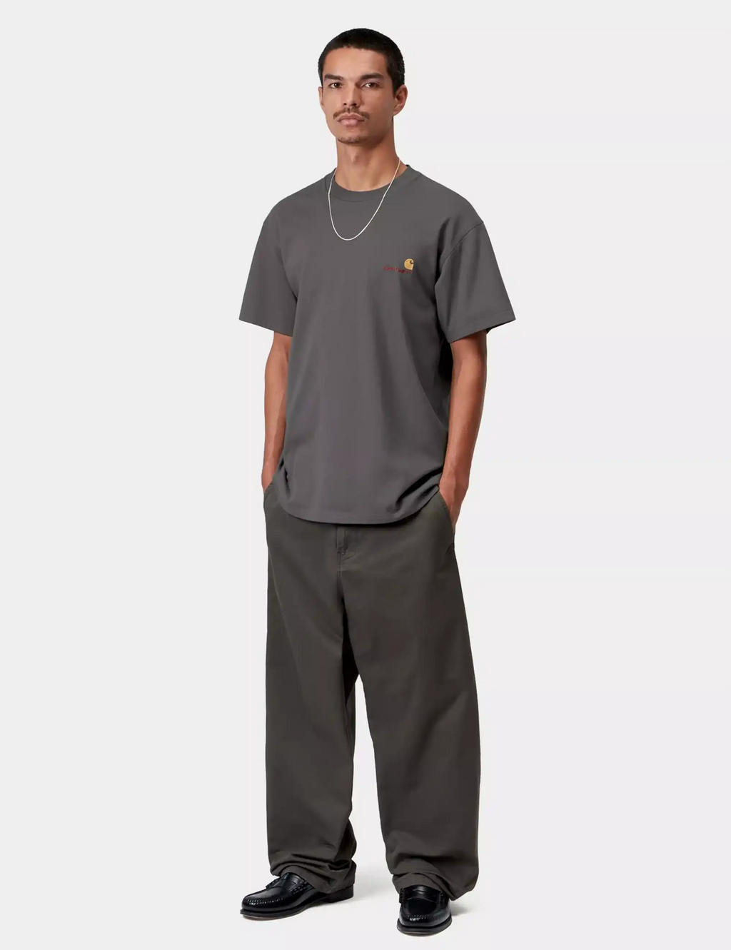 Graphite Carhartt WIP script logo T-shirt on model, crew neck short sleeves