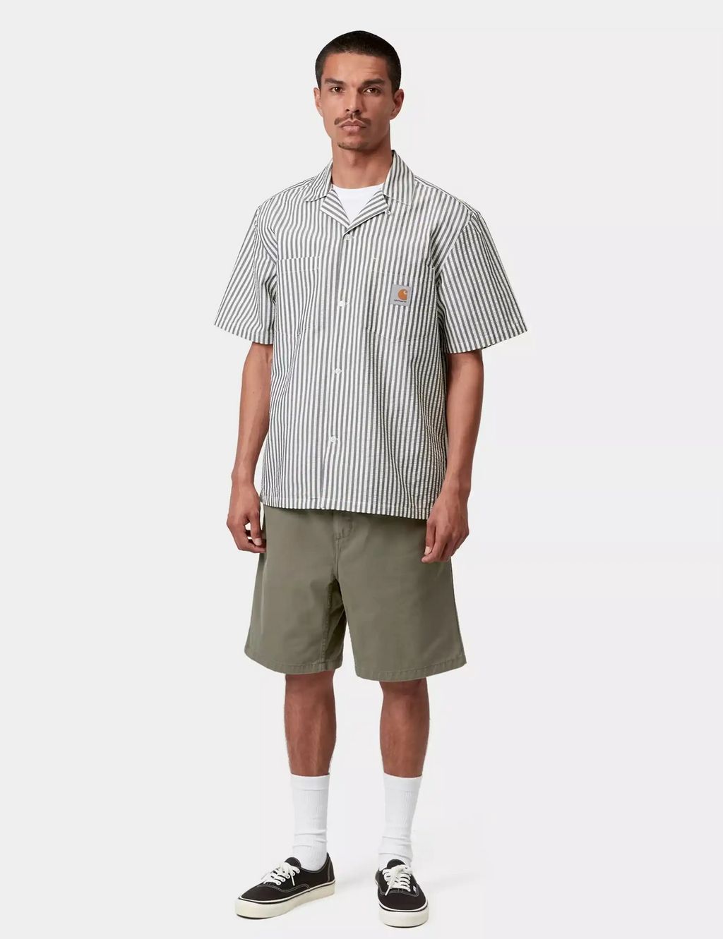 Men's leaf green shorts with belt loops and knee-length straight leg