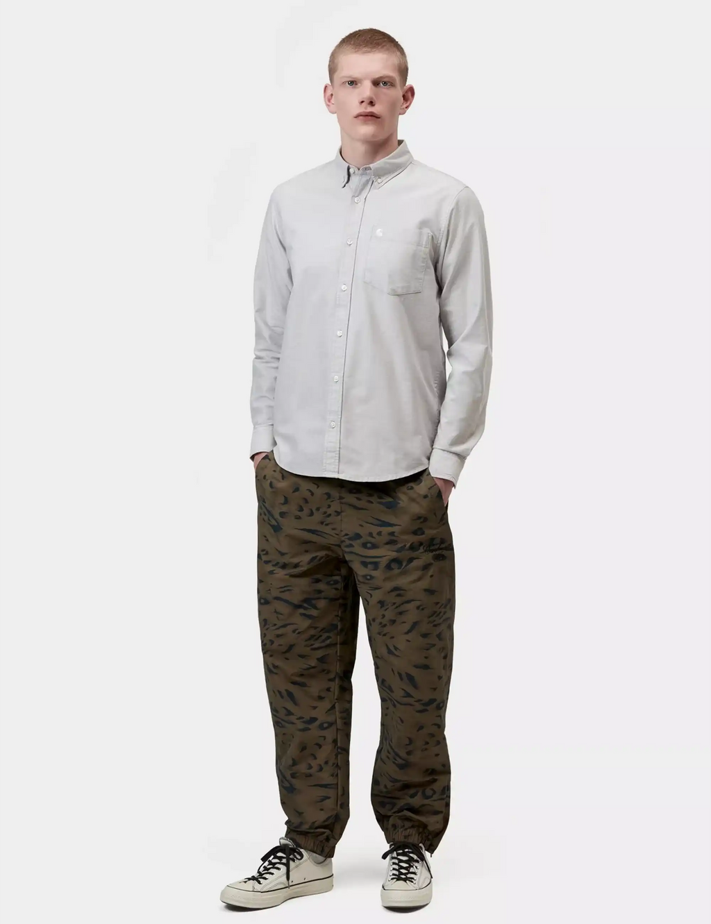 Carhartt WIP light gray long-sleeve button-up shirt with pointed collar and chest pocket