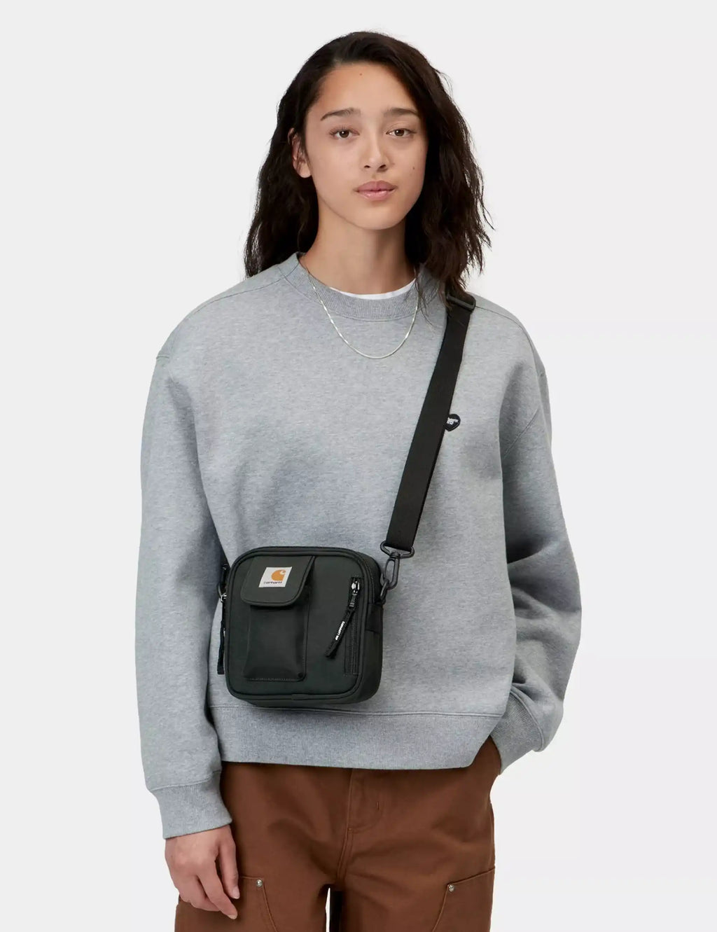 Essentials small crossbody bag, dark Raven green, adjustable strap and front pocket