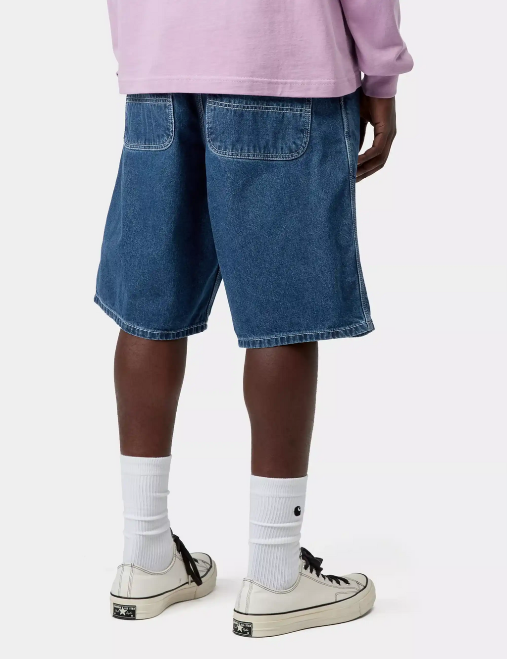 Blue stone-wash denim shorts with slanted front pockets and relaxed fit