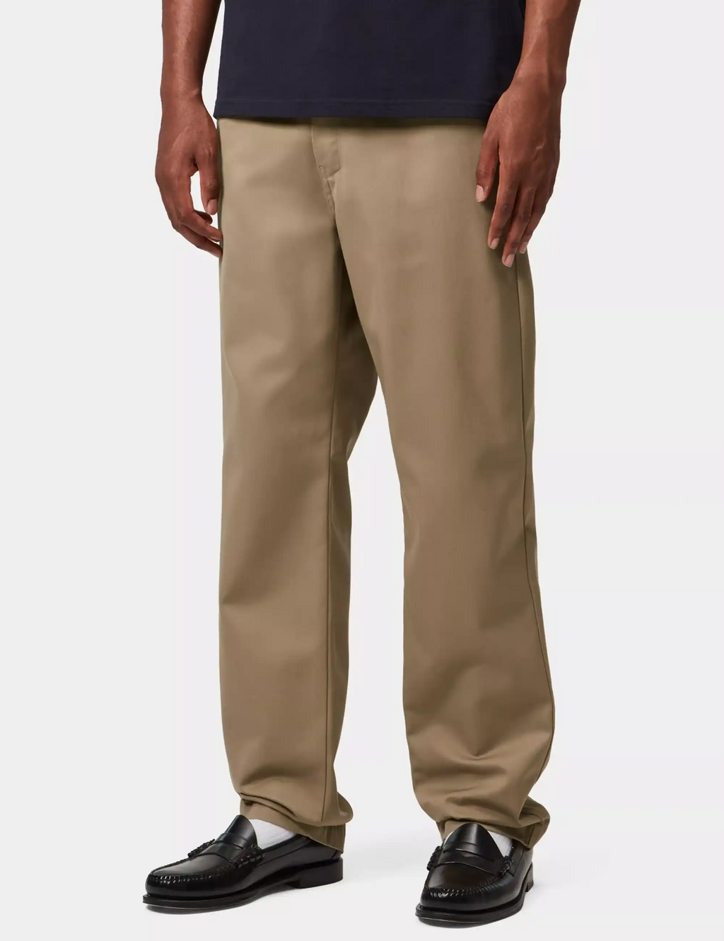 Beige leather straight-leg pants with stitched front creases and cuffed hem