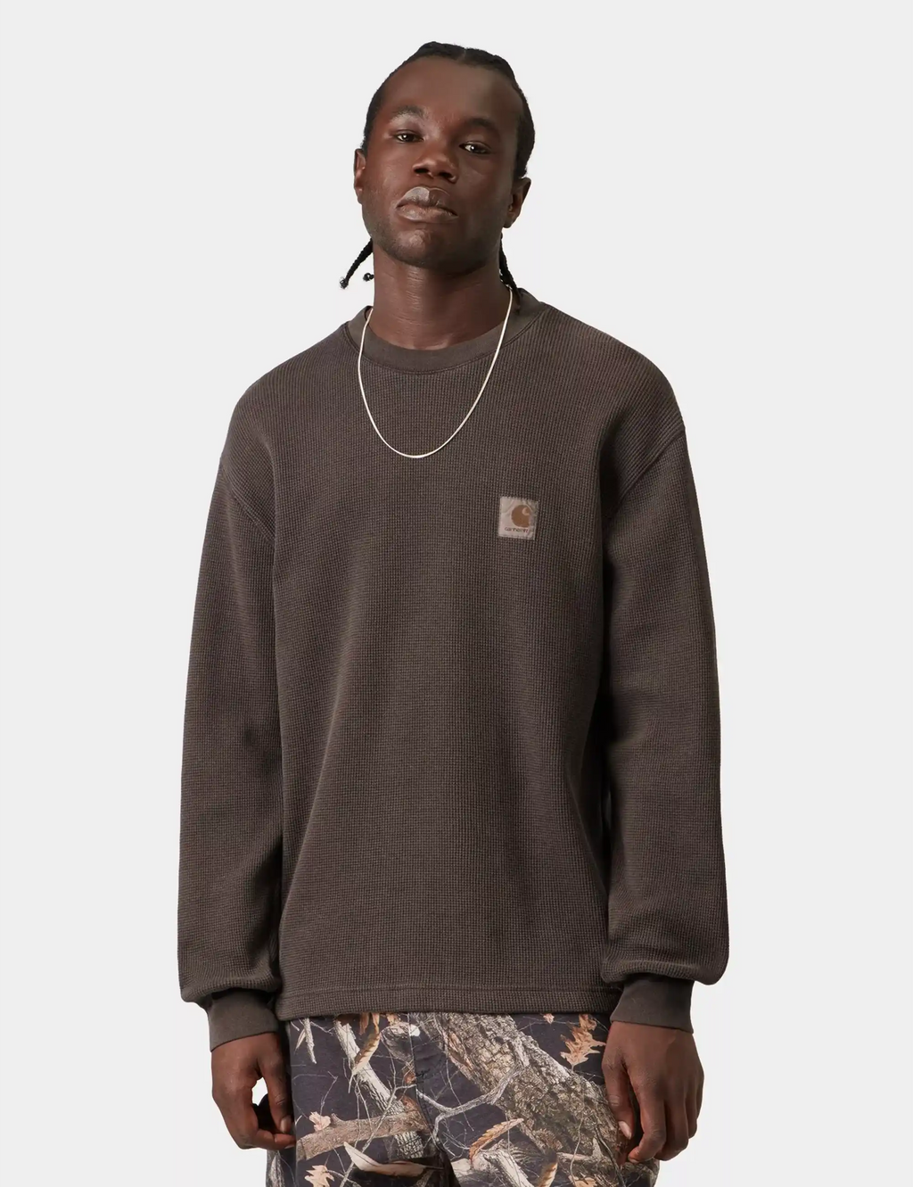 Dark brown long-sleeve waffle t-shirt with crew neck and chest logo