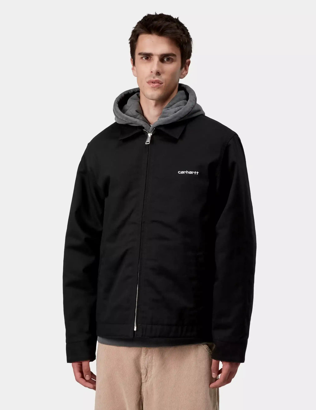 Black hooded zip jacket with gray hood lining and carhartt logo on chest