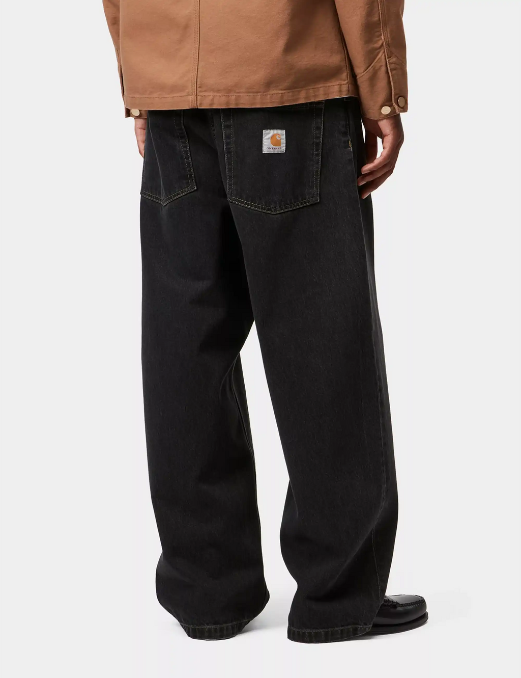 Black stone-washed denim pants with back patch pockets and logo, wide relaxed leg