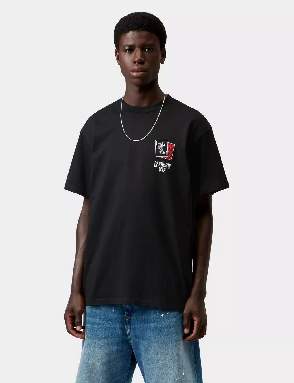Black T-shirt with chest logo patch on model