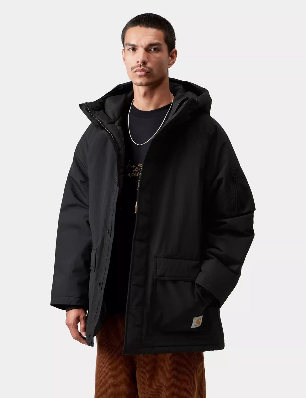 Black parka with adjustable hood, full-zip front, and flap front pockets