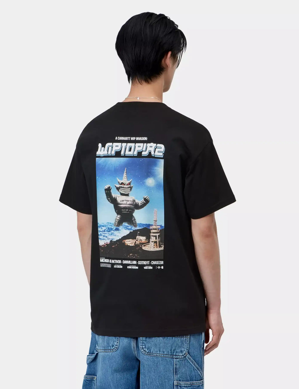 Black back graphic T-shirt with large character scene print, crew neck short sleeves