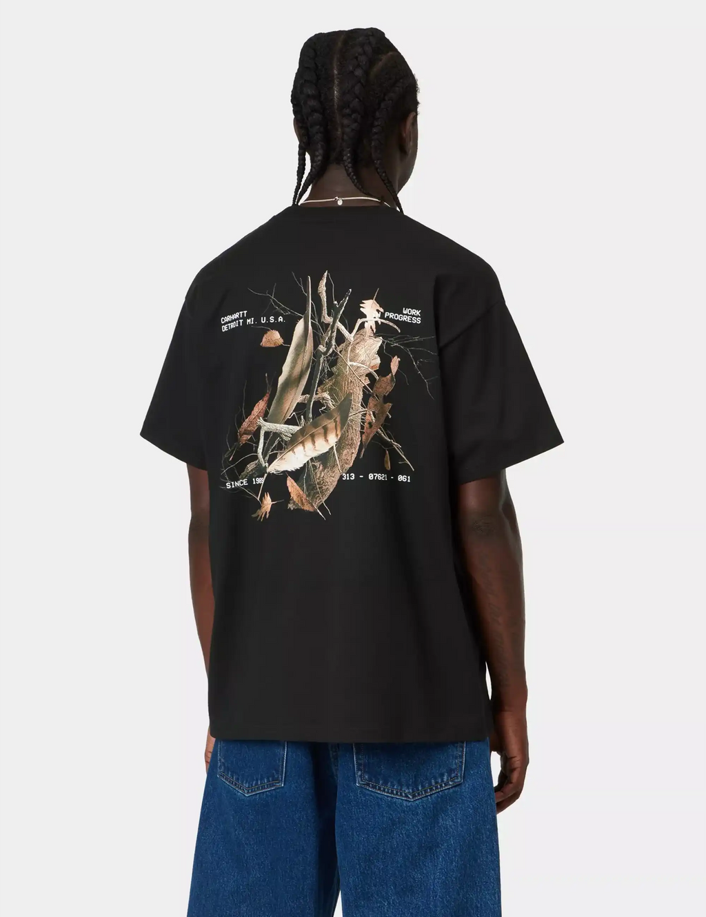 Black crewneck T-shirt with large animal graphic print on back