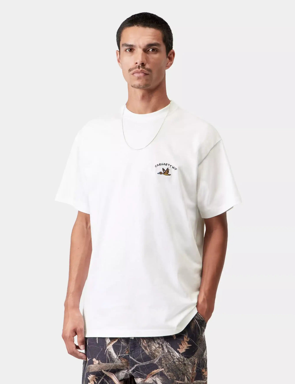 White crew-neck T-shirt with duck graphic at left chest, short sleeves.