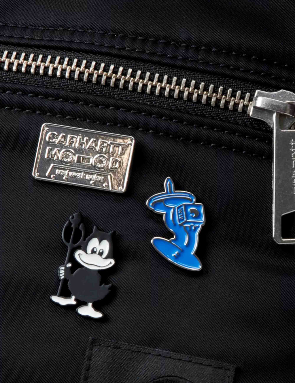 Multicolor enamel pin set with Mickey, blue character, and metal logo patch pin