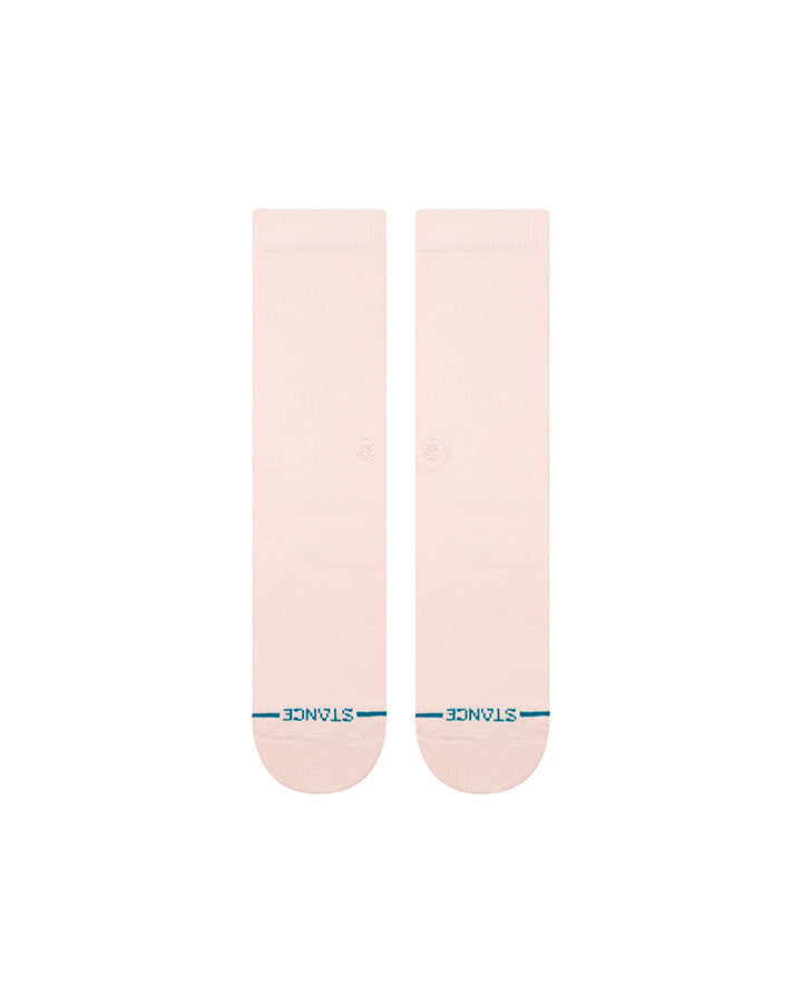 Pink crew socks showing back view with blue logo band near heel