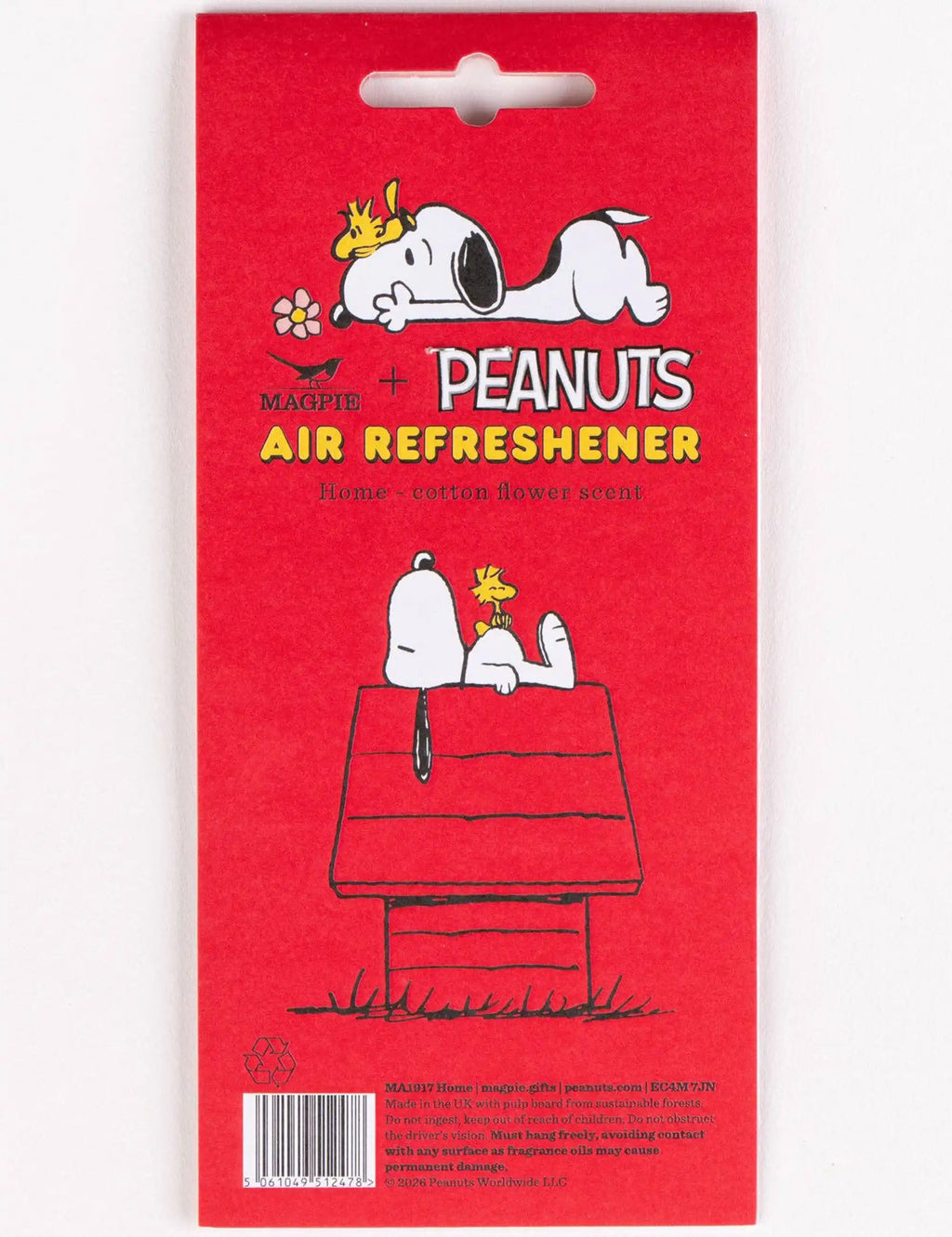 Peanuts air refreshener card featuring Snoopy holding a flower, red package
