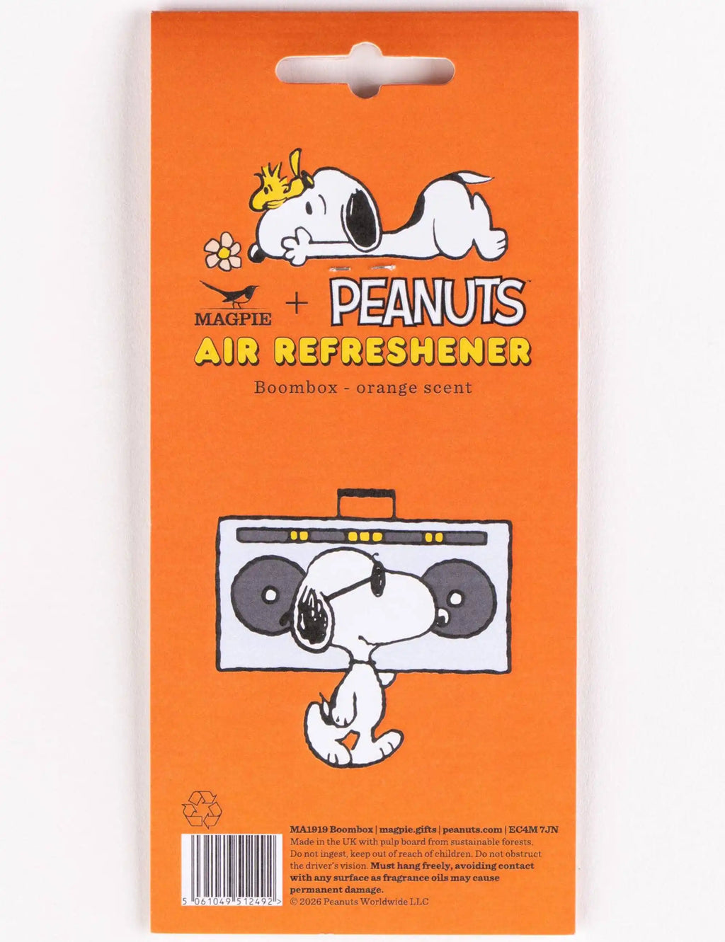 Peanuts air freshener package with Snoopy and boom box graphic, orange scent