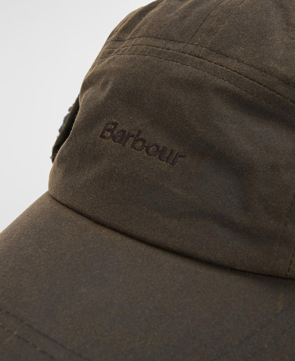 Olive Barbour logo patch on front of carpenter cap with stitched brim