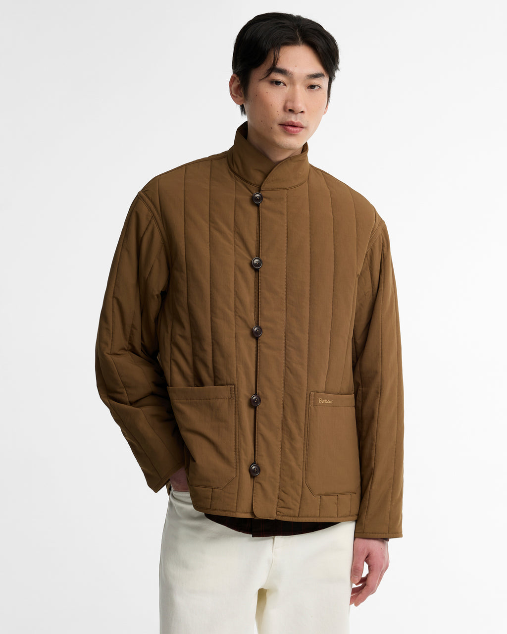 Sepia quilted jacket with stand collar, button placket, and two chest pockets