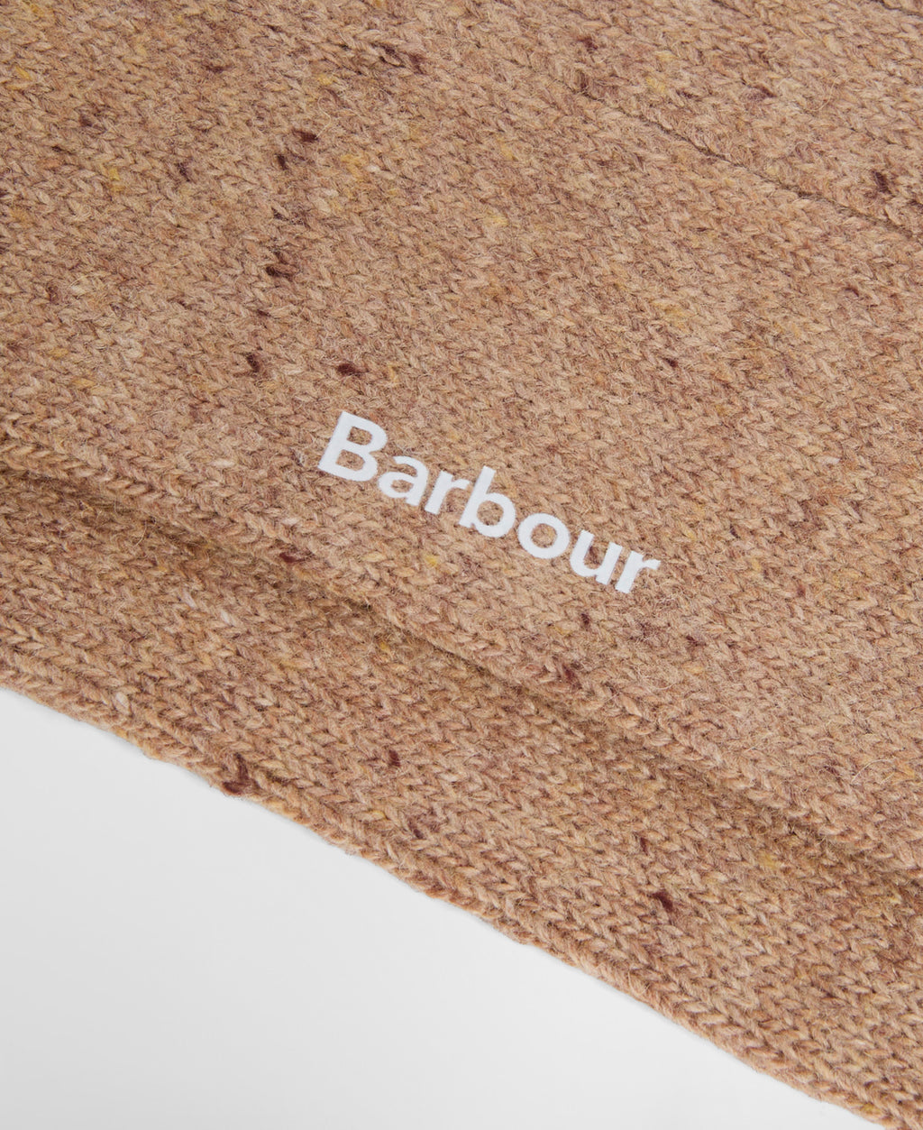 Knit crew sock cuff with Barbour logo in white on tan fabric