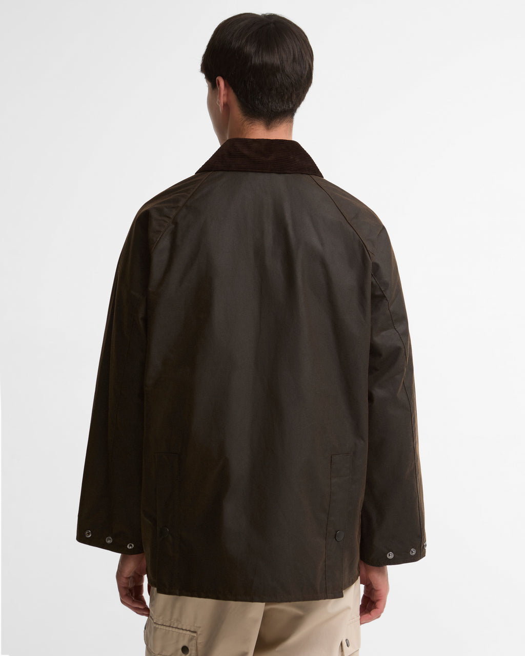 Dark brown wax jacket back view with cord collar and button cuffs