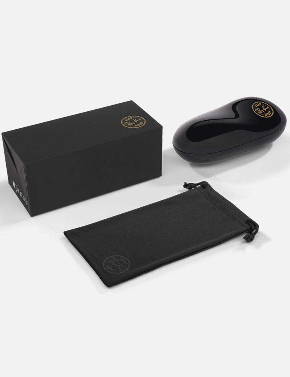 Black electronic device with packaging and pouch on a white background