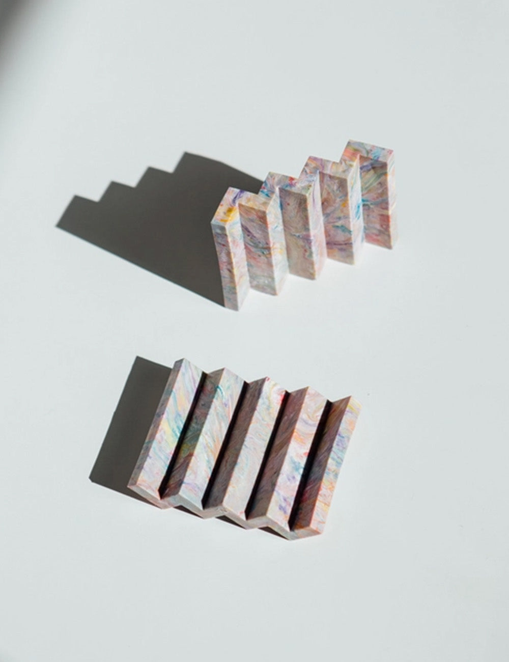 Color swatch tiles arranged in a pattern on a light gray background