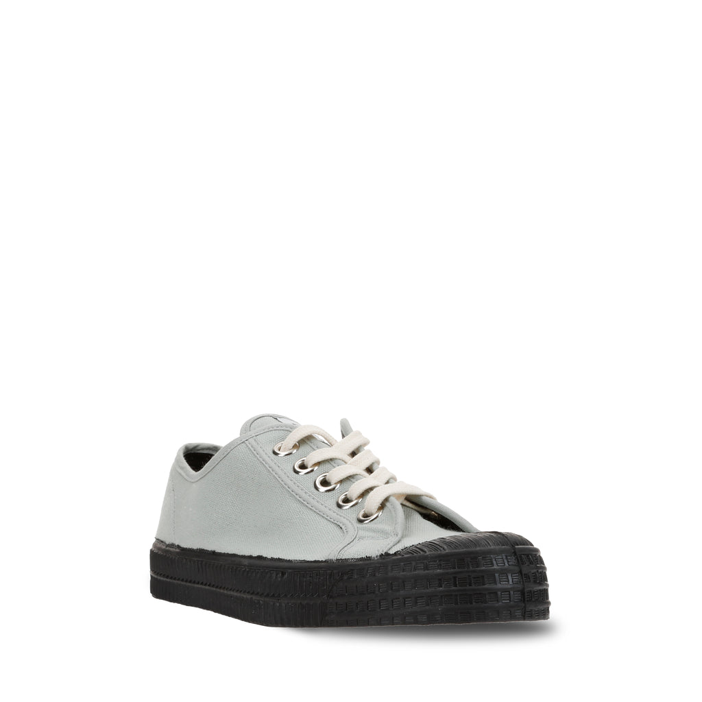 Sage canvas low-top sneakers with black sole, side view, lace-up design