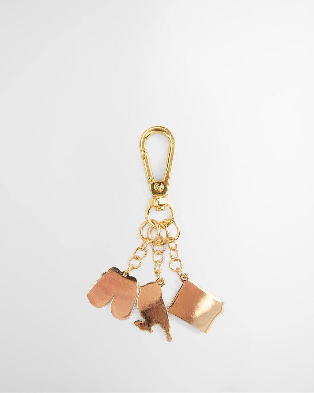 Gold key fob with bird-themed charm cluster and lobster clasp