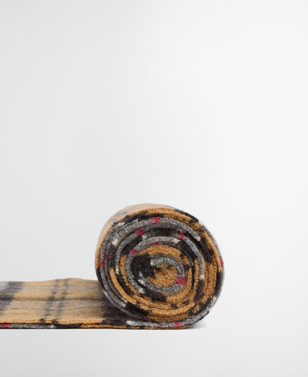 Rolled dark tartan lambswool scarf with fringed edge