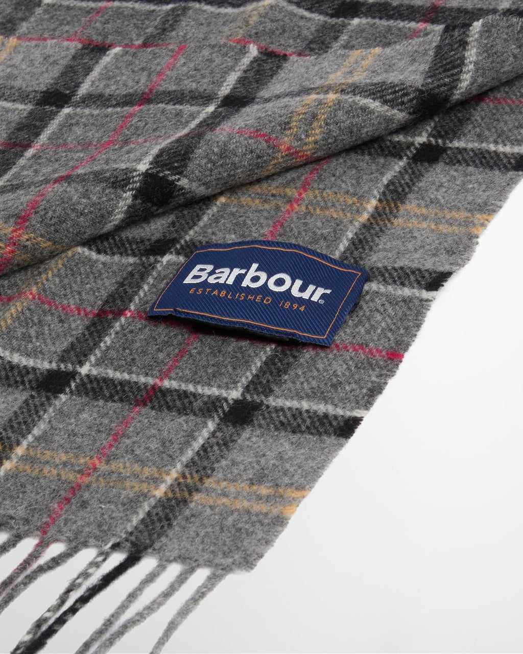 Grey tartan lambswool scarf with Barbour label on plaid fabric