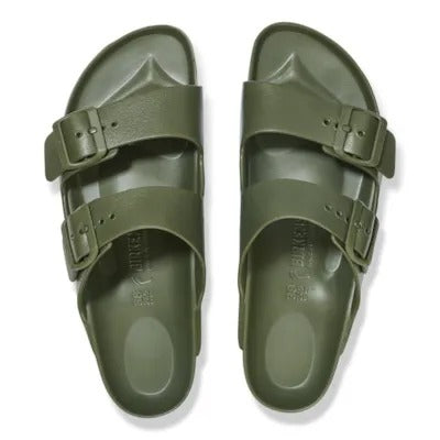 Pair of khaki EVA slide sandals with two buckled straps and contoured footbed