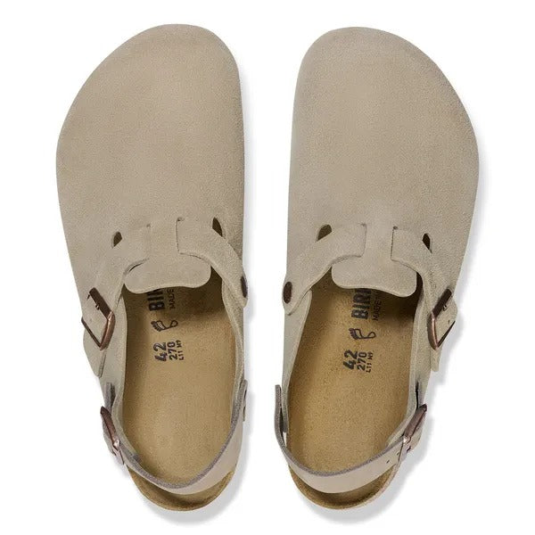 Taupe suede mule interior view with footbed label and adjustable buckle strap.
