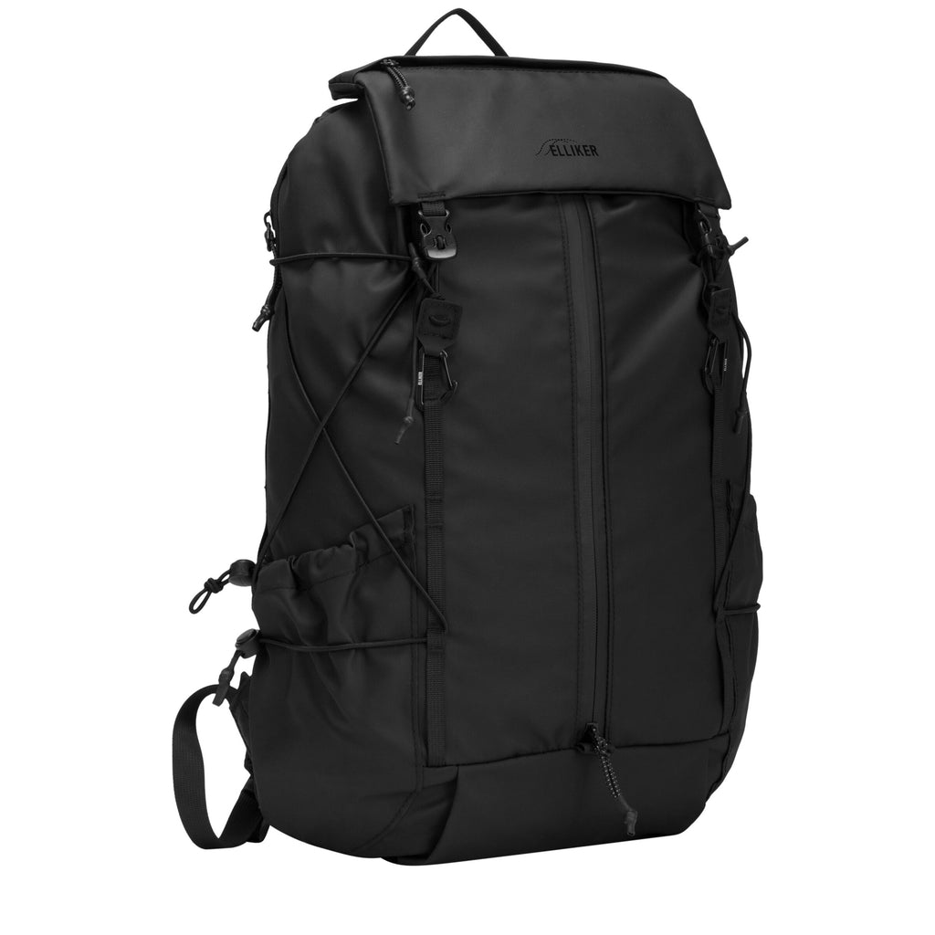 Black 23L flap-over backpack with top flap and side compression straps.