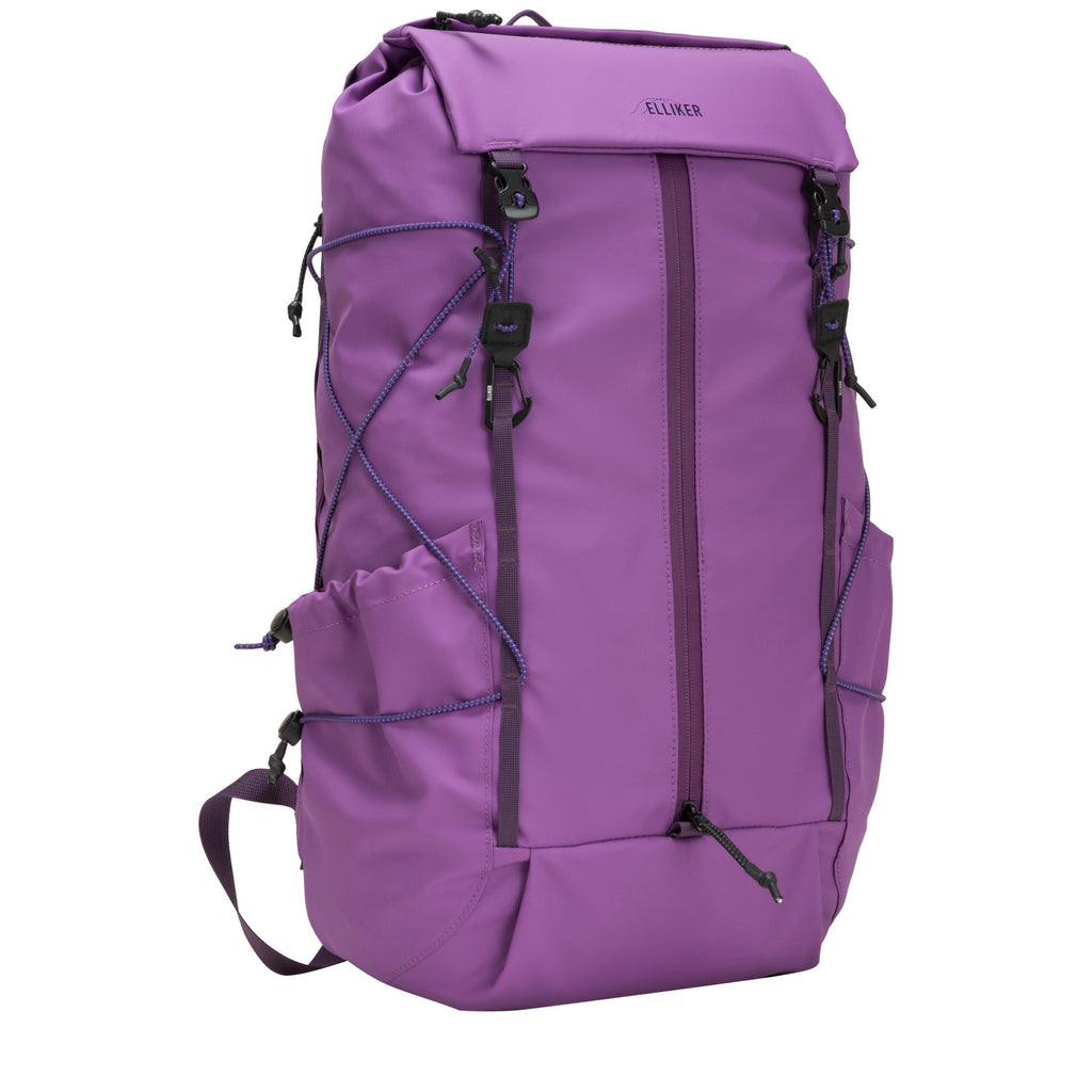 Electric purple 23L flap-over backpack with crossbody strap and top handle.