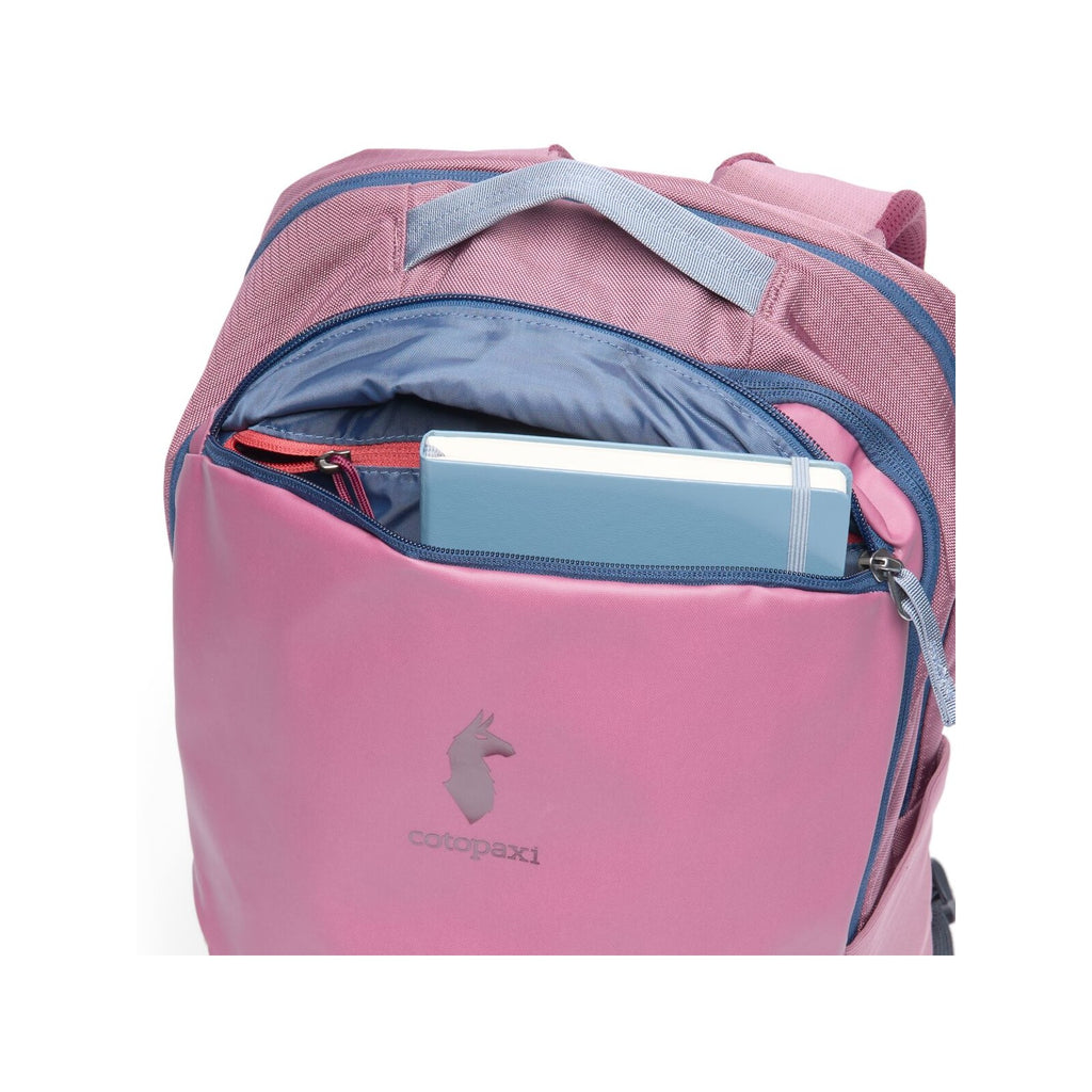 Fig daypack with open top zip pocket and blue-lined interior, catopaxi logo