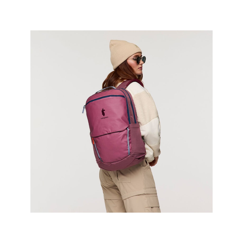 Fig daypack worn on back with front pocket and padded straps, catopaxi logo