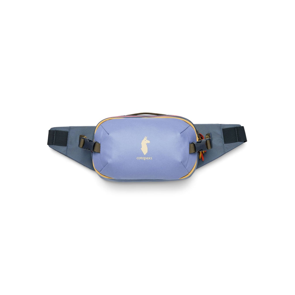Cotopaxi hip pack light blue front pocket with black adjustment strap and logo patch