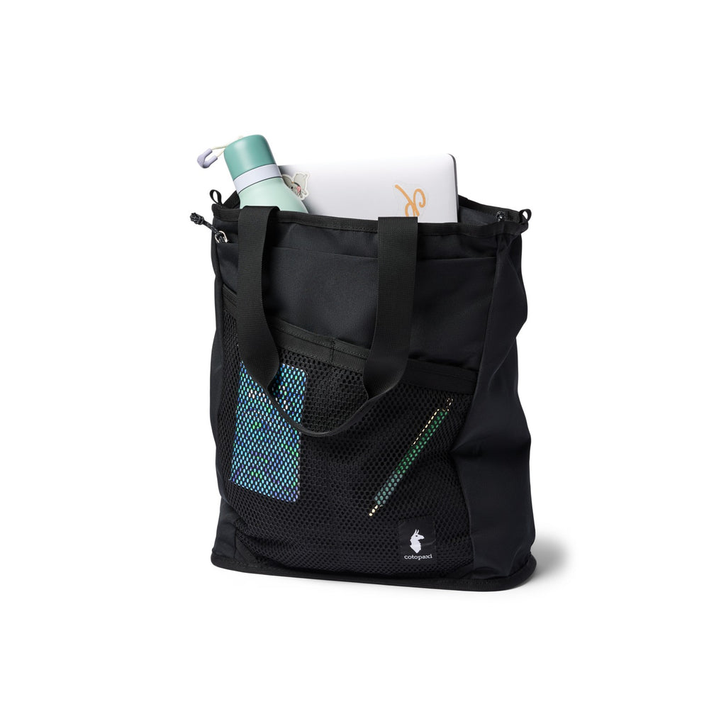 Black tote bag with front mesh pocket and green accent stitching detail