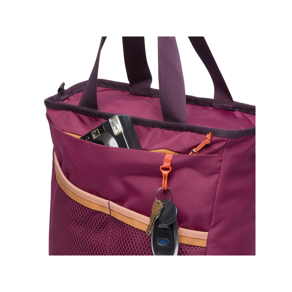 Cotopaxi Todo 22L Convertible Tote in Jam, open and packed showing side mesh pocket and key clip