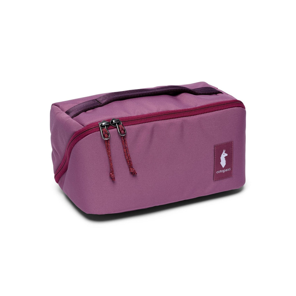Cotopaxi Viaje Toiletry Kit in Fig, front view with llama logo and contrast zip