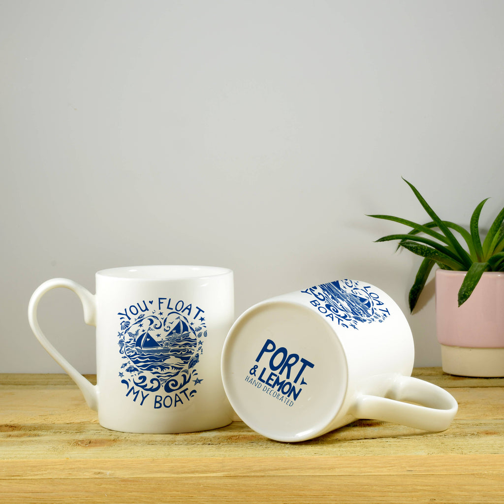 Bone china mug with blue boat art and "PORT LEMON" print
