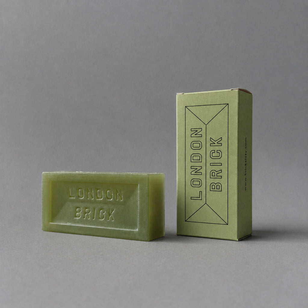 Green soap bar with embossed 'LONDON BRICK' on front, with matching box.