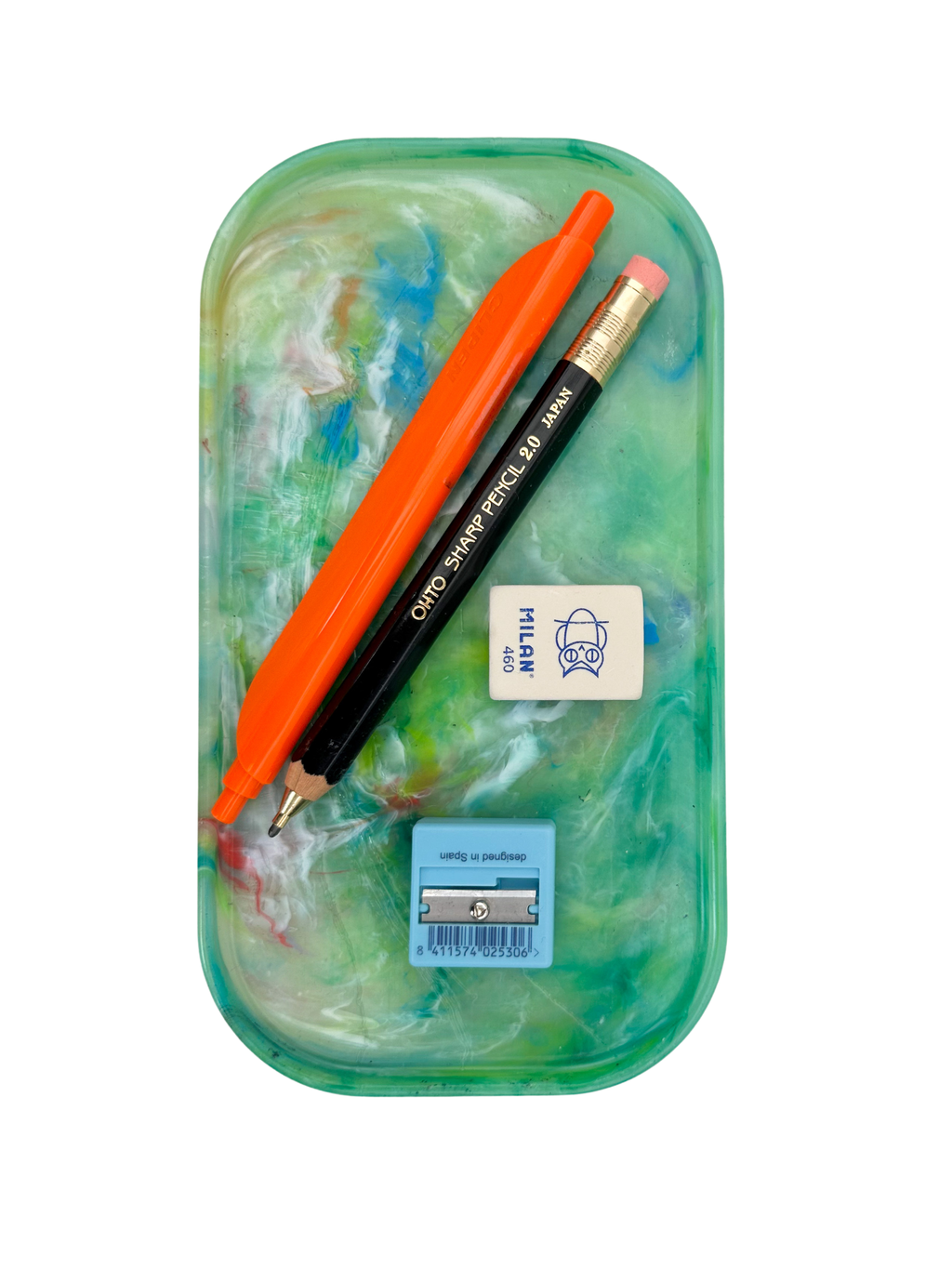 Green translucent marbled tray with rounded handle, holding a pencil and tag.