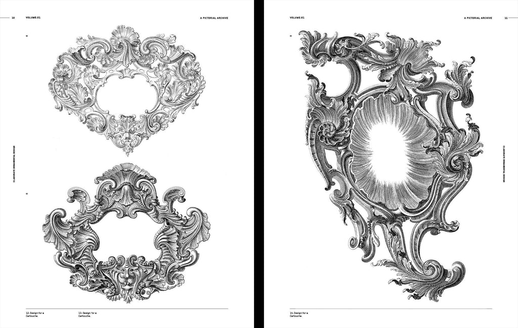 Open book pages with gray engraved ornamental frames, scrolls, and winged crest motifs