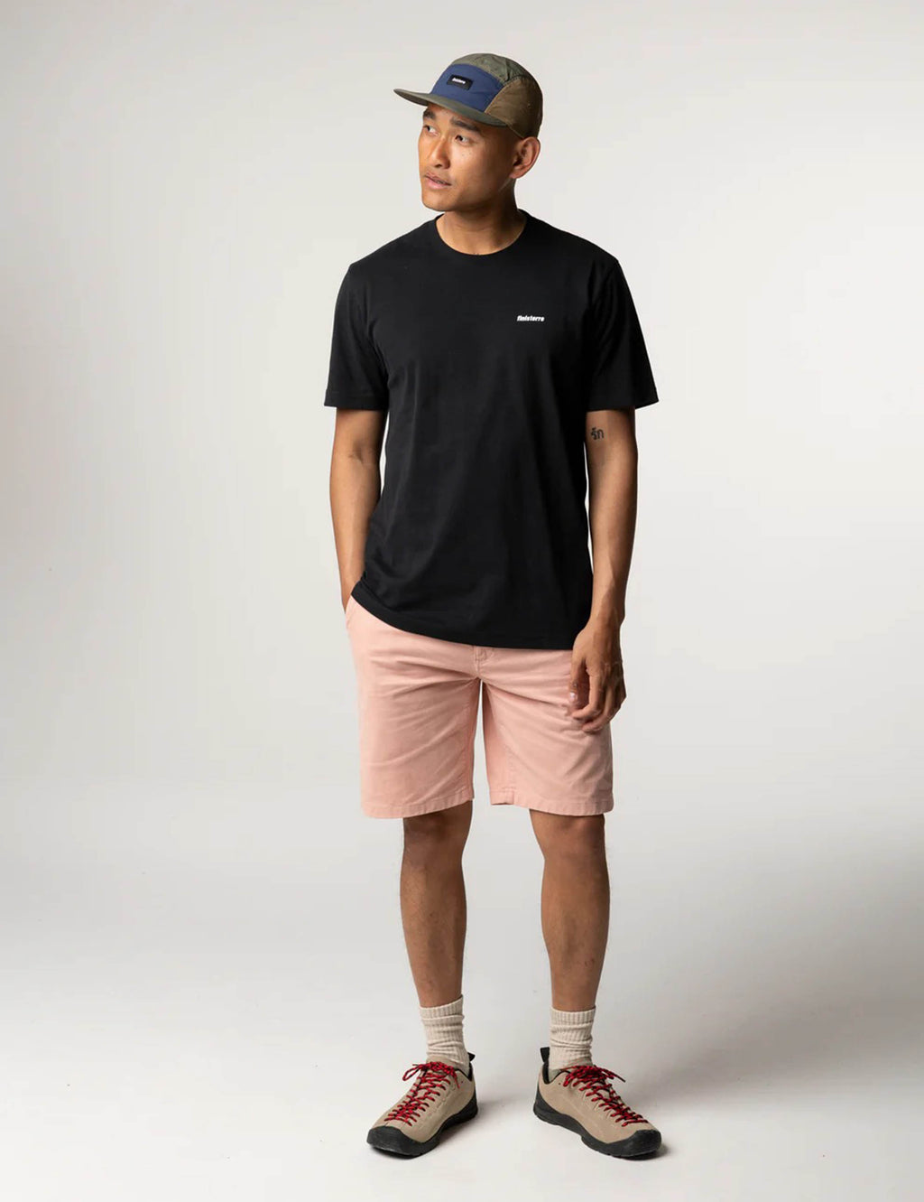 Finisterre Harlyn Logo Short Sleeve T-Shirt in Black, studio view