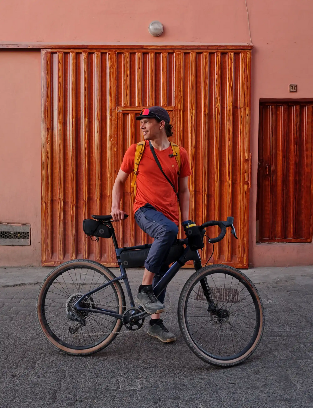 Bicycle with rider; snack bag not clearly visible in this view