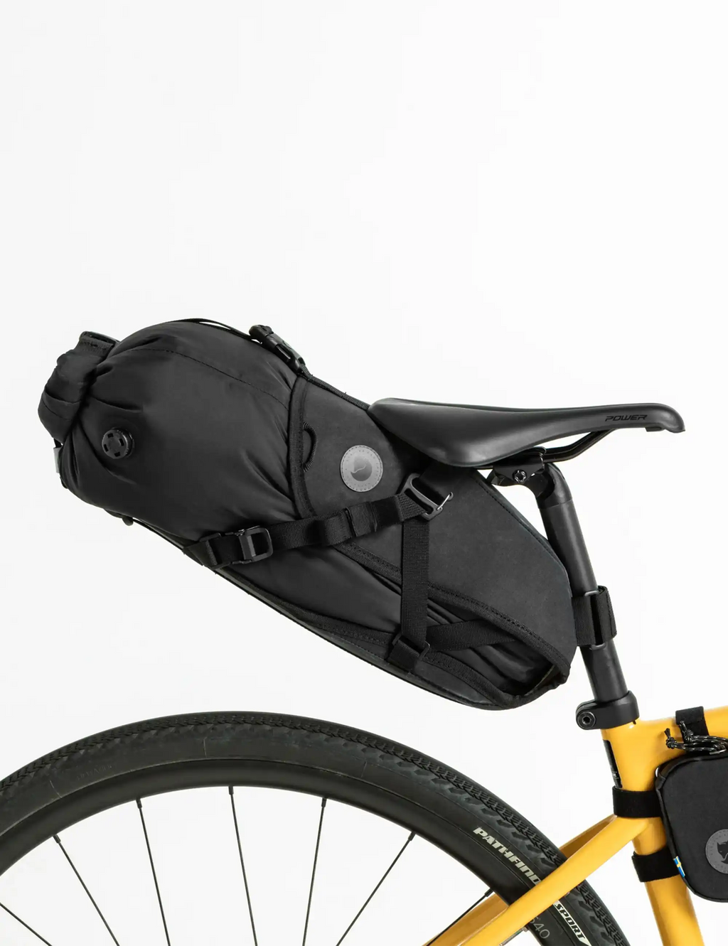 Black bicycle seatbag drybag with mounting straps and round patch