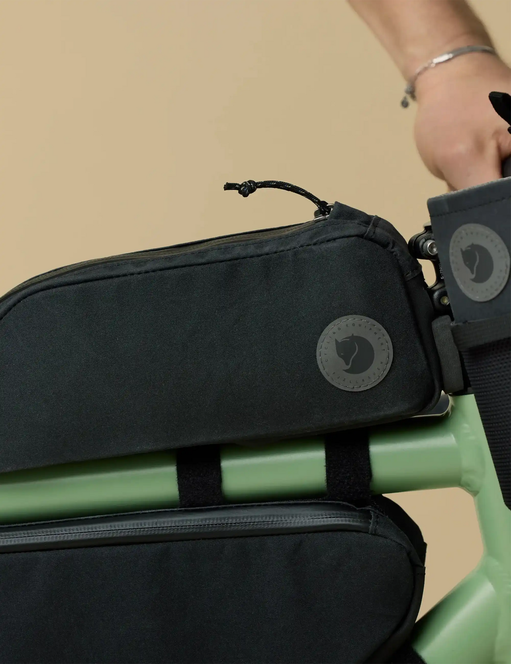 Hoja top tube bag, dark fabric with logo patch and front mounting strap loops