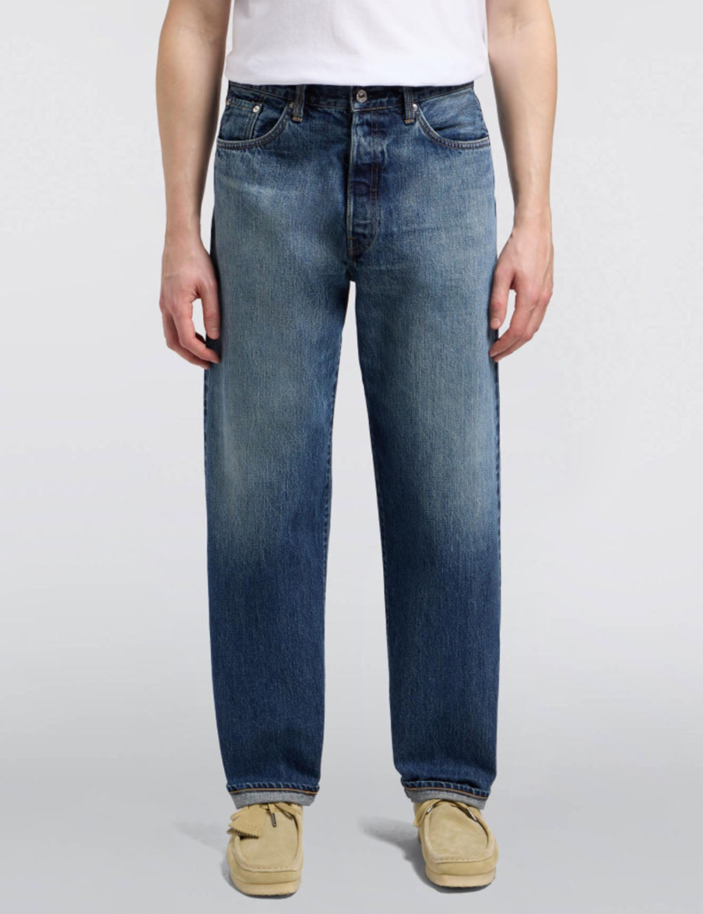 Loose dark blue denim jeans, straight leg with button-fly and belt loops