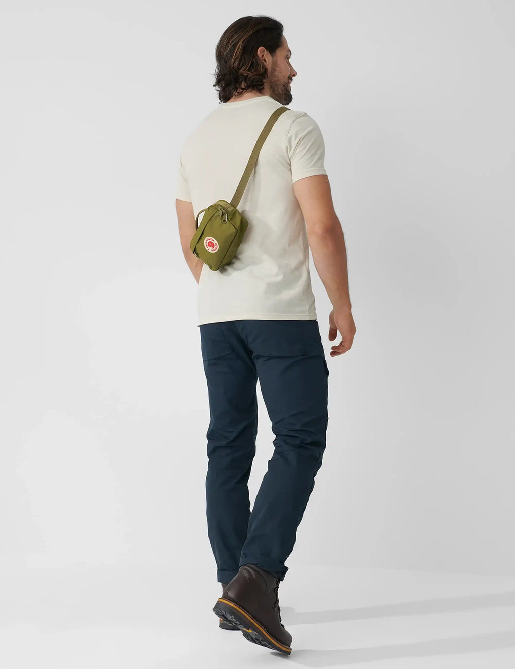 Fjällräven Kånken hip pack worn at the hip with logo and adjustable strap