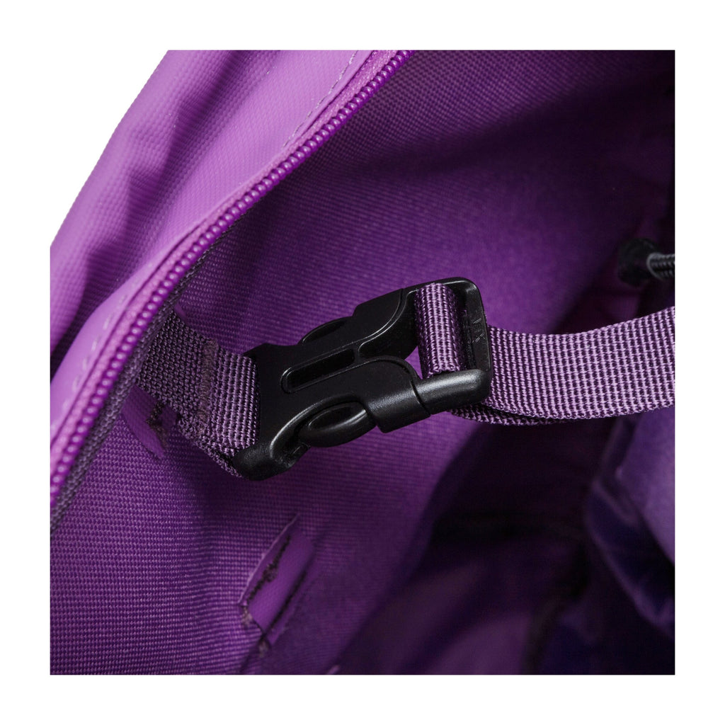 Inside close-up of electric purple tote backpack with purple strap and black plastic buckle