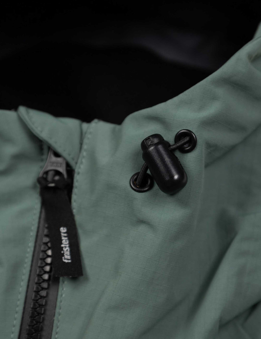 Finisterre Stormbird Waterproof Jacket in Deep Sea, back view